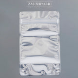 【ZAS】チャック付スタンド袋（表）OP#20//透明蒸着PET#12//CP#50（裏）OP#20//VMPET#12//CP#50